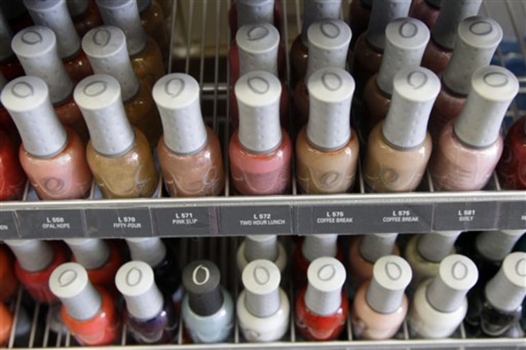 Nail care products are displayed at a beauty supply shop in San Francisco, Monday, April 9, 2012. California’s chemical regulators randomly sampled dozens of professional grade nail polishes that claimed to be free of a